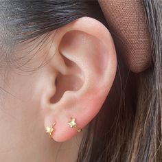 10k Solid Gold Tiny Butterfly Huggies Hoop Earring - Etsy Tiny Adjustable Ear Cuff As Gift, Delicate Huggie Hoop Earrings For Gift, Delicate Huggie Hoop Earrings As Gift, Delicate Small Hoop Cartilage Earrings As Gift, Dainty Nickel-free Ear Cuff, Small Hoop Pierced Cartilage Earrings As Gift, Nickel-free Star-shaped Huggie Earrings, Everyday Star Cartilage Earrings, Delicate Small Hoop Pierced Earrings