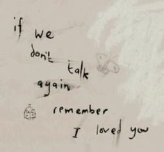 graffiti written on the side of a wall next to a clock and words that say if we don't talk again, i am remember i loved you