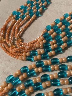 Double Strand Waist Bead - Brown Multi-strand Czech Glass Beaded Necklace, Multi-strand Blue Spacer Beads, Blue Multi-strand Spacer Beads, Coral Beaded Necklaces With Faceted Beads, Coral Beaded Necklace With Faceted Round Beads, Multi-strand Beaded Necklace With Large Czech Glass Beads, Colorful Multi-strand Czech Glass Beads, Blue Double Strand Beaded Necklace With Polished Beads, Coral Polished Beaded Necklaces