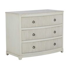 a white dresser with four drawers