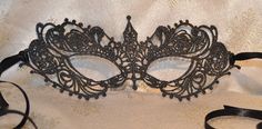 Black Lace Masquerade Mask  Black Glitter Masquerade Mask Black Double 6mm Satin Ribbons each side (Approx 1m) to secure your Mask Comfortable and Soft to wear all Evening Complete with Silver Organza Carry Bag Measures: 8.5" by 3" Approx and will fit most Adults Beautiful Mask for any Special Occasion Masquerade Balls, Charity Event Balls, Hunt Balls, End of Season Balls New Year's Eve Party Christmas Party Proms Weddings Halloween Parties Masquerade Mask Black, Black Masquerade, Black Masquerade Mask, Lace Masquerade Masks, Mask Ball, Satin Noir, Mask Black, Masks Masquerade, Charity Event