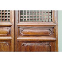 an old wooden door with decorative carvings on it