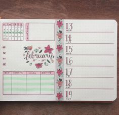 an open planner with flowers on it and the words february written in cursive writing