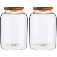 two clear glass jars with wooden lids