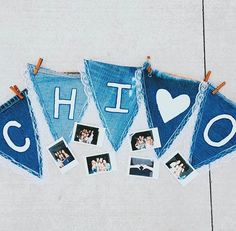 some blue and white flags with pictures on them