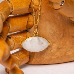 Long Moonstone Gold Necklace for layering 14k Gold Filled Satellite chain - Jewelry gift ideas for wife, mom, bride, bridesmaids, girlfriend Gemstone: Genuine Moonstone Pendant Size: 20x15mm Bezel: Vermeil Gold Chain: Satellite Chain: 14K Gold Filled with spring ring clasp Chain: 1mm Length: 24 inches About "Gold Filled Jewelry": Also called rolled-gold. These jewelry items are not actually filled with gold. They are made of a base metal covered by sheets of gold in a mechanical bonding process. Gift Moonstone Necklace With Adjustable Chain, Gold Moonstone Necklaces For Anniversary, Gold Moonstone Necklace For Anniversary, Gold Moonstone Necklace As Gift, White Moonstone Necklace With Delicate Chain, Gold Moonstone Necklace For Gift, White Oval Gold Plated Necklace, White Oval Gold-plated Necklace, White Gemstone Gold-plated Necklaces