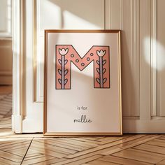 the letter m is for mulle in front of a white wall and wooden floor