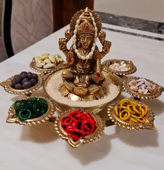 there is a small ganeshi decoration on the table