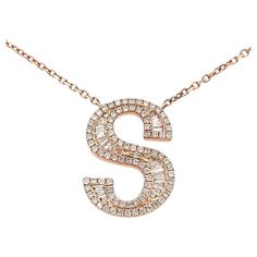 Introducing our exquisite diamond pendant necklace with a captivating letter S, this design is created using white diamonds in two different shapes, baguette, and round, with a total carat of 0.50 carats. These diamonds are G color with SI clarity. They are suspended delicately on a graceful chain. This enchanting piece combines elegance with contemporary sophistication, making it the perfect accessory for any occasion. This unique pendant is 14K rose gold, 16 inches long. This fine jewelry piece can be customized according to your preferences, just let us know, and we will create together the best jewelry for you. Unique Pendant, Diamond Pendant Necklace, Letter S, White Diamonds, Different Shapes, Diamond Pendant, Diamond White, Amazing Jewelry, Matrix