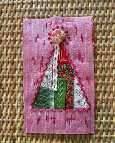 a piece of fabric with a christmas tree on it