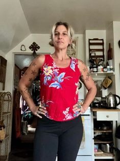 This is perfect and barely worn  1980's Avon brand cherry red tank top with hawaiian floral print  Boxier fit to tank  Thicker straps  Scoops fairly low in the back  Cotton material  Seems barely worn in perfect condition  So vibrant and colorful  Tag is in near perfect condition  Fits a womens medium  Measurements are approximate and taken flat so please double bust and waist for more accurate sizing  Bust: 18 in  Waist: 18 in  Length: 21.5 in  All sales are final  Thanks for checking out Cereal Vintage Thrift  Recycle Reuse Recreate Red Tropical Print Cotton Tops, Red Cotton Tops With Tropical Print, Red Floral Print Summer Tank Top, Red Floral Print Tank Top For Vacation, Vintage Sleeveless Top For Vacation, Sleeveless Cotton Top With Tropical Print, Cotton Sleeveless Top With Tropical Print, Summer Sleeveless Hawaiian Tops, Hawaiian Sleeveless Summer Tops