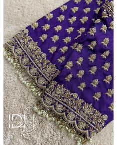 Saree Blouse - Purple and Gold color Heavy Maggam Work (Maggam Work) Blouse - Saree Blouse - Size 38 (can alter 36, 40, 42) Fabric : Pure Silk Color : Purple and Gold color Size : 38 inches ( Can be altered to 36, 40, 42 inches) Sleeves : 11 Inches Neck : Front 6 inches, Back - 8.5 inches/FRONT OPEN Blouse Length : 15 inches Washing instructions : Dry wash only. Note : 10% Colors may vary slightly due to lighting. If you are interested in purchasing this item and have any questions about this it Zardosi Blouse, Latest Bridal Blouse Designs, Boat Neck Blouse Design, Maggam Work Blouse, Maggam Work Designs, Traditional Blouse Designs, Latest Model Blouse Designs, Cutwork Blouse Designs, Wedding Blouse Designs