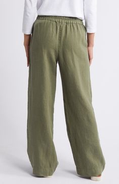 Crafted from lightweight linen, these tie-waist pants feature breezy wide legs for vacation-ready vibes. 30 1/2" inseam; 22" leg opening; 11 1/2" front rise; 17" back rise (size Medium) Elastic/drawstring waist Side-seam pockets 100% linen Machine wash, line dry Imported Casual Linen Pants With Tie Waist, Relaxed Fit Linen Wide Leg Pants With Tie Waist, Solid Color Wide Leg Pants For Vacation, Vacation Wide Leg Full Length Pants With Pockets, Relaxed Fit Wide Leg Pants With Tie Waist, Solid Wide Leg Pants For Vacation, Green Linen Beach Pants, Vacation Linen Wide-leg Bottoms, Solid Linen Pants For Vacation