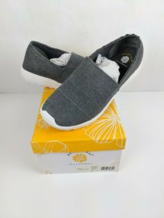 NEW in box Mellow Mat Yellow Box Voxy Shoe Color:  Gray Women's size:  8M  (my opinion:  they run small) Mellow Mat™ Call off the search, for you’ve found the sandals that provide style without sacrificing comfort! Discover a comfort-focused Yellow Box Mellow Mat™ EVA dual-density sandal collection. The bouncy, shock-absorbing Mellow Mat™ is inspired by the yoga mat material and it shapes to your feet. The Yellow Box Mellow Mat™ Collection includ Yellow Trail Running Shoes With Cushioned Footbed, Yellow Low-top Running Shoes With Boost Midsole, Yellow Low-top Training Running Shoes, Neon Yellow Low-top Sneakers With Cushioned Footbed, Yellow Box Shoes, Grey Women, Slip On Sneaker, Baby Shoes, Womens Sizes