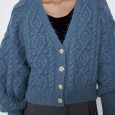 V-Neck Cardigan With Long Sleeves. Front Jewel Button Closure. Rib Trim. Machine Wash Max. 30c/86f Delicate Cycle Machine Wash Max. 30c/86f Delicate Cycle Do Not Use Bleach / Whitener Do Not Use Bleach / Whitener Iron Maximum 110c/230f Iron Maximum 110c/230f Do Not Dry Clean Do Not Dry Clean Do Not Tumble Dry Do Not Tumble Dry Blue V-neck Cardigan With Buttons, Blue V-neck Sweater With Button Closure, Elegant V-neck Cable Knit Outerwear, Zara V-neck Outerwear With Buttons, Elegant Blue Knit Cardigan, Elegant V-neck Sweater With Buttons For Winter, Elegant Blue Sweater With Button Closure, Blue Cable Knit V-neck Cardigan, Chic Zara Cable Knit Cardigan