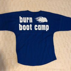 Brand New Burn Boot Camp Baseball Tee With Monogram Kda On The Front For Initials Kad. Size S But Runs Big Blue Outdoor Tops With Screen Print, Blue Cotton Tops For Outdoor, Blue Graphic Print Top For Outdoor, Outdoor Blue Cotton Tops, Blue Crew Neck Top For Camping, Blue Cotton Tops For Camping, Casual Text Print Top For Camping, Casual Top With Text Print For Camping, Casual Pre-shrunk Camp Shirt