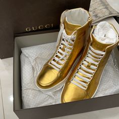 Brand New Authentic Gucci Luxury Lace-up Sneakers, Luxury Gold Lace-up Sneakers, Designer Gold Lace-up Sneakers, Gucci Luxury Lace-up High-top Sneakers, Gucci Luxury High-top Sneakers For Streetwear, Luxury Gucci High-top Sneakers For Streetwear, Designer Gold High-top Sneakers, Gold Leather High-top Sneakers With Round Toe, Luxury Gucci High-top Sneakers