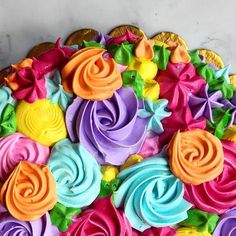 there is a cake decorated with colorful icing