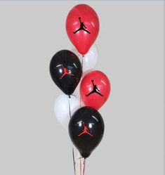 the air jordan balloons are in black, white and red