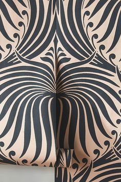 an abstract black and white wallpaper with swirls on it's back side