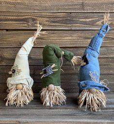 three scarecrows made out of old jeans