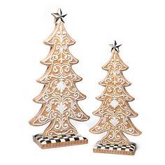 two wooden christmas trees with black and white checkers