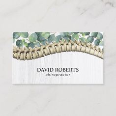 a business card with an image of a fern plant on it's back and the words, david roberts chiropator