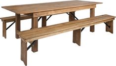 a wooden table and two benches sitting next to each other