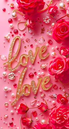 pink roses and pearls with the word love spelled in gold letters on top of them