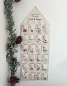 a christmas themed calendar hanging on the wall