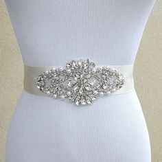 a bridal belt with crystal stones on it