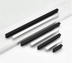 four different types of black and white magnets