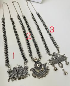 Restocked : High quality Oxidised long necklace that will go with Indian as well as western outfits. It's quality necklace with weight ! Adjustable length from 24 to 28 inches .  Price is per necklace. Pattern 4 : 20 to 24 inches long  no pendant  Whole set : The whole set comes with long necklace, small choker necklace, 4 bangles ( size 2.6) , jhumkis, ring and nose pin Pattern 5 : with peacock pendant  Pattern 6 : Big circle pendant Small Choker Necklace, Navratri Necklace, Oxidized Choker, Peacock Pendant, Oxidized Necklace, Nose Pin, Jewelry Indian, Wedding Jewellery Necklace, Circle Pendant