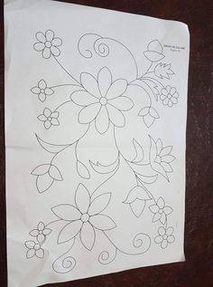 a piece of paper that has some flowers on it