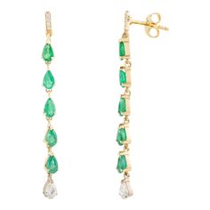 These Elongated Teardrop earrings showcase a 2.16-carat pear-cut emerald, elegantly suspended in a linear drop design. Each earring features a single, breathtaking emerald framed by diamonds, enhancing its vibrant green hue. The minimalist yet luxurious design exudes sophistication, making these earrings a captivating choice for those who appreciate timeless beauty and refined elegance. Perfect for elevating any ensemble. Emerald enhances intellectual capacity of the person.  Designed with pear cut emerald with drop diamond making linear dangle earrings in solid gold. This is a perfect May Birthstone Jewelry also perfect Engagement Gift, Bridal Shower Gift, Women Gift, Mother Gift, Gift For Sister, Mother Daughter Gift, Bride To Be Gift, Bridesmaid Gift, Wedding Gift, Anniversary Present, Perfect Engagement Gifts, Mother Daughter Gifts, Drop Design, Luxurious Design, Emerald Gemstone, Vibrant Green, Emerald Diamond, Diamond Sizes, Daughter Gifts