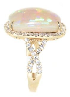 yellow gold opal and diamond ring Elegant Ethiopian Opal Ring For Formal Occasions, Opal Ring With Diamond Accents For Formal Occasions, Elegant Opal Ring With Diamond Accents, Elegant Yellow Gold Opal Ring With Gemstone Accents, Luxury Opal Ring With Diamond And Gemstone Accents, Elegant Gold Opal Ring With Gemstone Accents, Elegant Ethiopian Opal Ring, Luxury Diamond Opal Ring With Gemstone Accents, Diamond Decorations