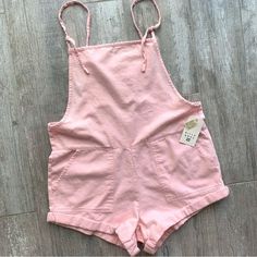 Omgg These Playsuits Are Sooo Cute!!! Billabong Australia Exclusive!! This Pink Colorrr!! Thick Acid Wash Canvas Construction Adjustable Straps Front Patch Pockets Back Patch Pockets Lovve The Relaxed Fit ... Tons Of Surf/Skate/Snow Gear In My Closet! Soo Many Bikinis And One Pieces!! Lemme Know If You Need Help Starting A Bundle!! Make Sure To Check Out The Rest Of My Page And Don’t Be Afraid To Ask Me Any Questions! - Makita Sleeveless Summer Shortalls With Pockets, Summer Cotton Shortalls Overall, Pink Short Overalls For Summer, Pink Shortalls For Summer, Pink Sleeveless Cotton Overalls, Fitted Pink Overalls With Pockets, Sleeveless Pink Cotton Overalls, Spring Pink Bib Front Overalls, Trendy Pink Summer Overalls