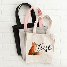 "Animal Tote Bag, Fox Bag, Fox Lover Gift, Cute Custom Bag, Outdoor Bag, Personalized Tote Bag, Cute Animal Bag, Custom Tote Bag, Cute Bag ║ ABOUT OUR TOTES ║ ◆ Dimensions: 14.75 Inches x 14.75 Inches, with 22-inch handles and a 5-inch gusset. ◆ Material: 100% cotton canvas, with heavy-duty woven handles. ◆ Care: Spot clean with mild soap and water. ◆ Each bag comes packaged so that it is ready for gift giving! ◆ Image is professionally screen printed to ensure vibrant images. ◆ Sending as a gif Cafe Kitsune Tote, Animal Design Tote Bag For Gift, Animal Design Tote Bag For Daily Use, Black Animal Design Tote Bag, Fox Bag, Eco-friendly Tote Bag With Cat Design, Fox Lover, Animal Bag, Outdoor Bag