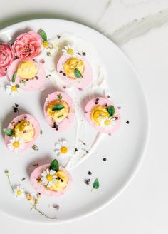 an instagram page with flowers and deviled eggs on a white plate, along with the caption