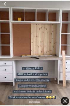 the built in bookcase is being used as a desk