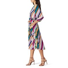 Multicolor striped georgette (100% polyester). Wrap. Long sleeve. V-neckline. Lined. Side pockets. 47" from shoulder to hemline. Imported. Spring Dresses With Vertical Stripes In Multicolor, Spring Multicolor Striped Dresses, Chic Striped V-neck Dress, Striped V-neck Midi Dress For Work, Striped V-neck Midi Dress For Day Out, V-neck Dress With Vertical Stripes For Day Out, Chic Multicolor Vertical Stripes Dress, Rent The Runway, Closet Designs