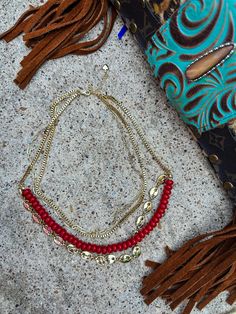 Introducing our Four-Piece Layered Necklace, a bold and chic statement piece designed to elevate any outfit. This set features a variety of gold chains in different textures and lengths, creating a beautifully layered look.The combination of the warm gold tones and the rich red jade creates a harmonious balance between elegance and edge.  Specs: Closure: Lobster claw Necklace Length: 16" with a 2.5" extender Fall Necklace, Claw Necklace, Autumn Necklace, Red Jade, Necklace Layered, Necklace Boho, Different Textures, Layered Necklace, Kansas City Chiefs