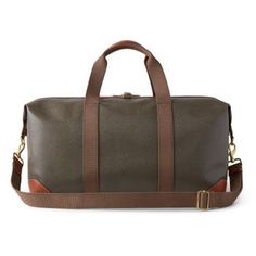 Nothing says 'classic Mulberry' like our Scotchgrain luggage collection. Its beautifully textured surface is accented by smooth leather trim. Travel pieces should be built to last, and look good while doing it. A timeless travel bag in a medium size, this clipper has two short handles and a detachable shoulder strap. Leather trim detailing Two canvas handles with leather detailing Detachable and adjustable canvas shoulder strap Metal feet at the base of bag Detachable luggage tag Internal Mulber Brown Coated Canvas Bag For Business Trips, Luxury Brown Coated Canvas Luggage, Designer Brown Luggage, Luxury Travel Luggage With Leather Backing, Designer Brown Luggage With Leather Handles, Modern Brown Coated Canvas Travel Bag, Designer Brown Luggage With Leather Trim, Designer Brown Duffle Bag With Leather Handles, Designer Brown Travel Bag For Business Trips