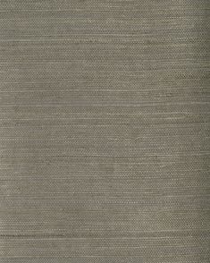 an area rug that is made up of grey fabric