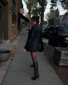 Knee High Brown Boots Black Leather Jacket Brown Boots, Leather Jacket And Tights Outfit, Oversized Knee High Boots, Tall Black Heeled Boots Outfit, Brown Boots Black Tights, Tall Heel Boots Outfit, Tall Heeled Boots Outfit, Tall Black Boots Outfit Work, Black Stiletto Boots Outfit