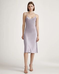 The classic silk slip dress features midi length and bias cut for a flattering fit. It is made from 100% washable 19mm Mulberry silk satin and hand washable and easy to wear. Don’t feel bad if you find yourself wearing it more than you should. Grey Lilac, Silk Mini Skirt, Silk Fiber, Silk Tee, Blue Silk Dress, Silk Outfit, Silk Camisole, Overlay Dress, Silk Slip Dress