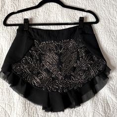 Free People Black Beaded Tap Shorts. Satin Lined With Flutter Layer At Edges. Hidden Side Zip And Snap. Flawless Beading, Extra Beads Still Attached. Nwot. Never Worn. 1920s Vibe. Embellished Bottoms For Evening Wear In Summer, Elegant Ruffled Skort For Party, Embellished Fitted Bottoms For Cocktail, Glamorous Mini Skirt For Festival, Black Embellished Mini Skirt For Cocktail, Party Season Embellished Skirt Bottoms, Embellished Party Season Skirt, Embellished Mini Skirt For Cocktail, Elegant Mini Skirt For Festival