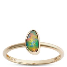 Ignite your imagination with the striking depth of an opal gemstone set in 14K yellow gold. The beauty lies in the elegant simplicity – a single opal stone in a smooth shank band. The 14K yellow gold band is comfortable and straightforward, making it a great option for all skin tones and perfect for pairing with other jewelry. Opal Stone, Opal Ring, Ring Size Guide, Jewelry Cleaner, Gold Band, Opal Gemstone, Opal Rings, Cleaning Jewelry, Gold Bands