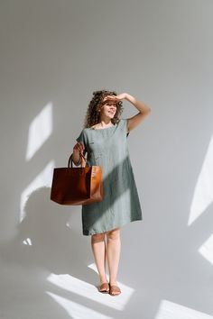 "Easy-to-wear, comfortable free form dress Alice. Dropped shoulders, side pockets, relaxed fit. Dress length from shoulder to hem 40,1 '' /  102 cm The model is wearing  dress in grey pearl , size L in 160 GSM linen Your wardrobe next \"most worn item\" .  FOR SIZE GUIDE see images above" Summer Linen Dress For Everyday Wear, Casual Linen Dress For Everyday Spring Wear, Casual Spring Linen Everyday Dress, Casual Linen Dress With Pockets For Day Out, Everyday Summer Dresses With Slip Pockets, Casual Linen Spring Dress With Side Pockets, Casual Spring Linen Dress With Side Pockets, Casual Linen Work Dress With Side Pockets, Casual Workwear Linen Dress With Side Pockets