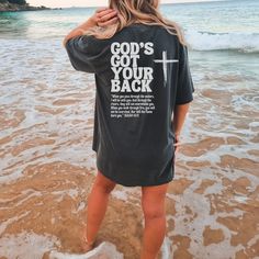 Isaiah Shirt, Comfort Colors God's Got Your Back Shirt, Christian Shirt, Jesus T-Shirt, Bible Verse Tee, Isaiah 43, Christian tshirts women GOD'S GOT YOUR BACK ❤ When you pass through the waters, I will be with you; and through the rivers, they shall not overwhelm you; when you walk through fire you shall not be burned, and the flame shall not consume you. PLEASE NOTE THIS IS A BACK PRINT DESIGN ONLY. THE FRONT IS PLAIN ❤️ ✦ FEATURES ✦ ✿  What makes these t-shirts so special? Well, there's an ar Cool Christian Tshirts, Cross Tshirt Designs, Godly Shirts, Christian T Shirt Ideas, Scripture Clothing, Jesus T Shirts, Christmas Sweatshirt Ideas, Walk Through Fire, God Shirts